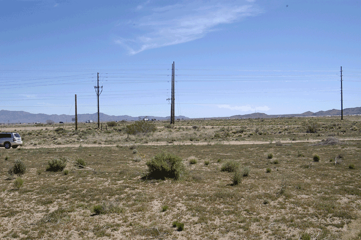 Up Sage Rd., showing power poles Looking North over lots Looking West ...